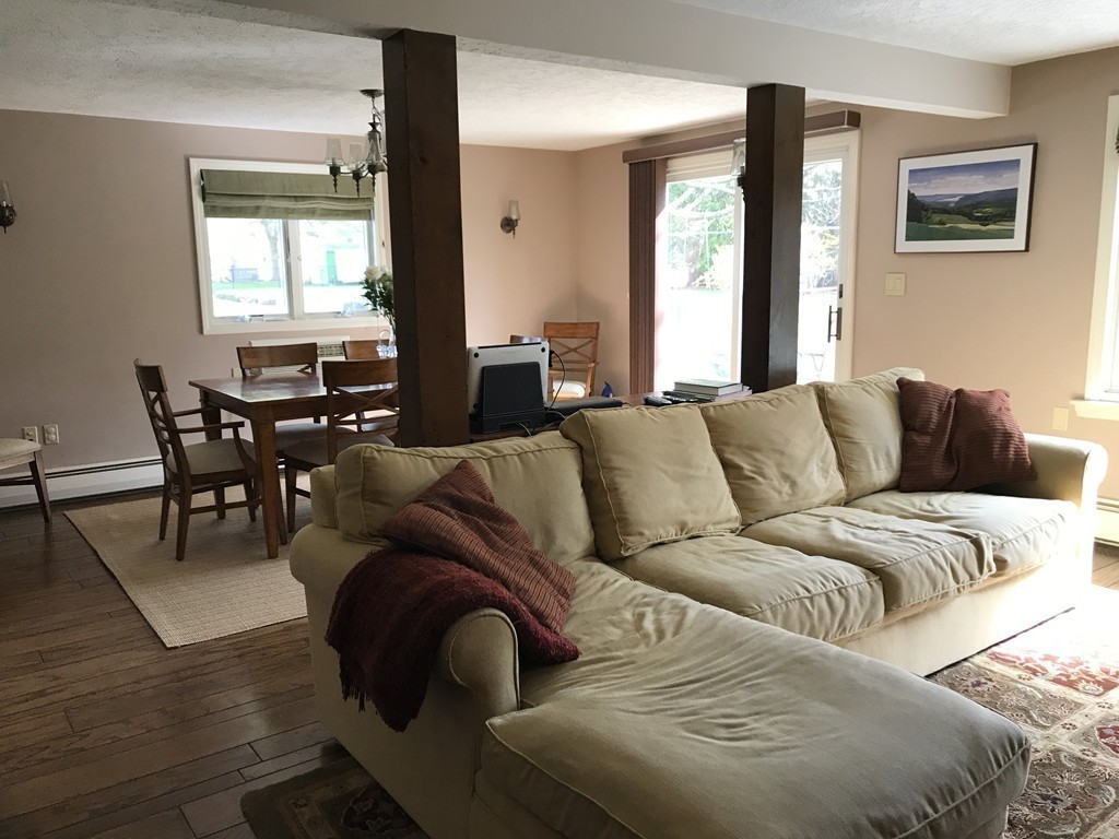 31 Elmfield Road Framingham, MA 01701 - Photo 11 of 25 a living room with furniture and a large window