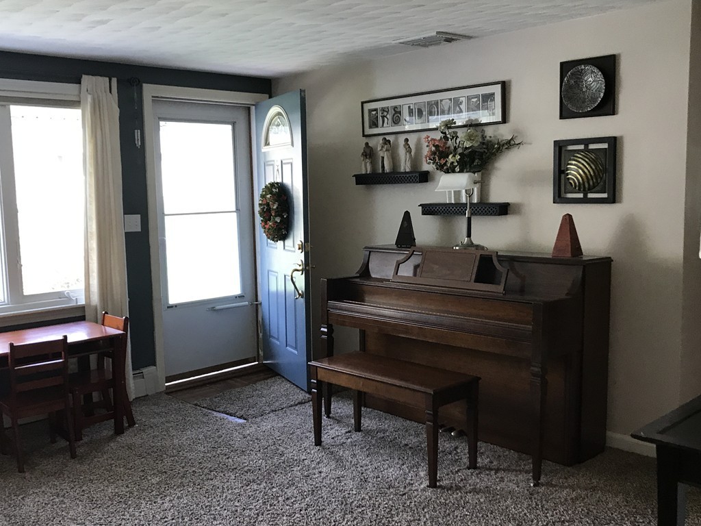 31 Elmfield Road Framingham, MA 01701 - Photo 5 of 25 a living room with furniture and a window