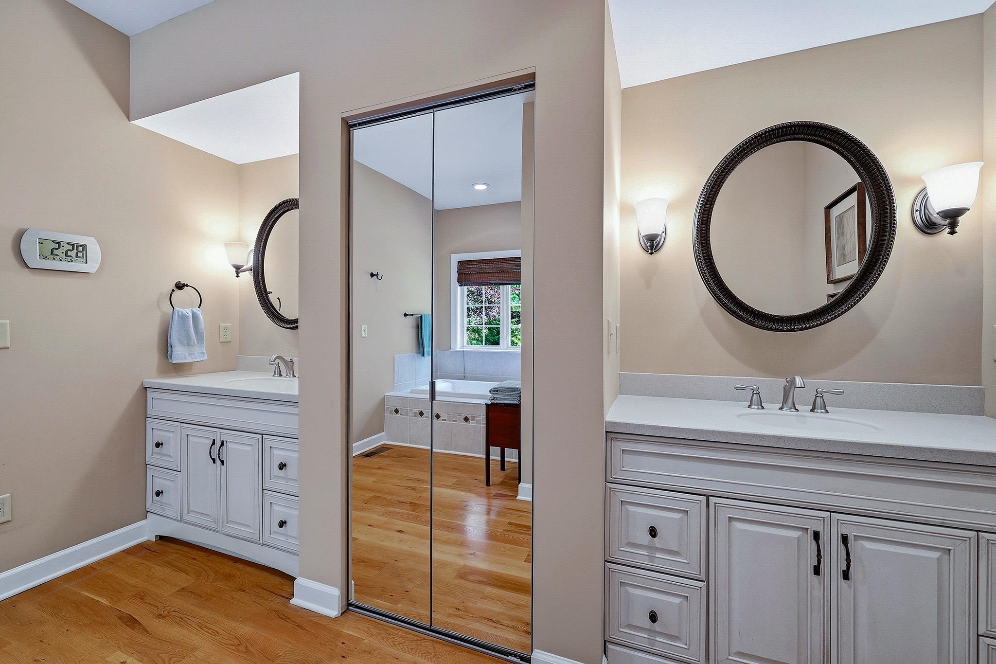 759 Rife's Ford Road Verona, VA 24482 - Photo 27 of 66 a en suite bathroom with a granite countertop sink and a mirror