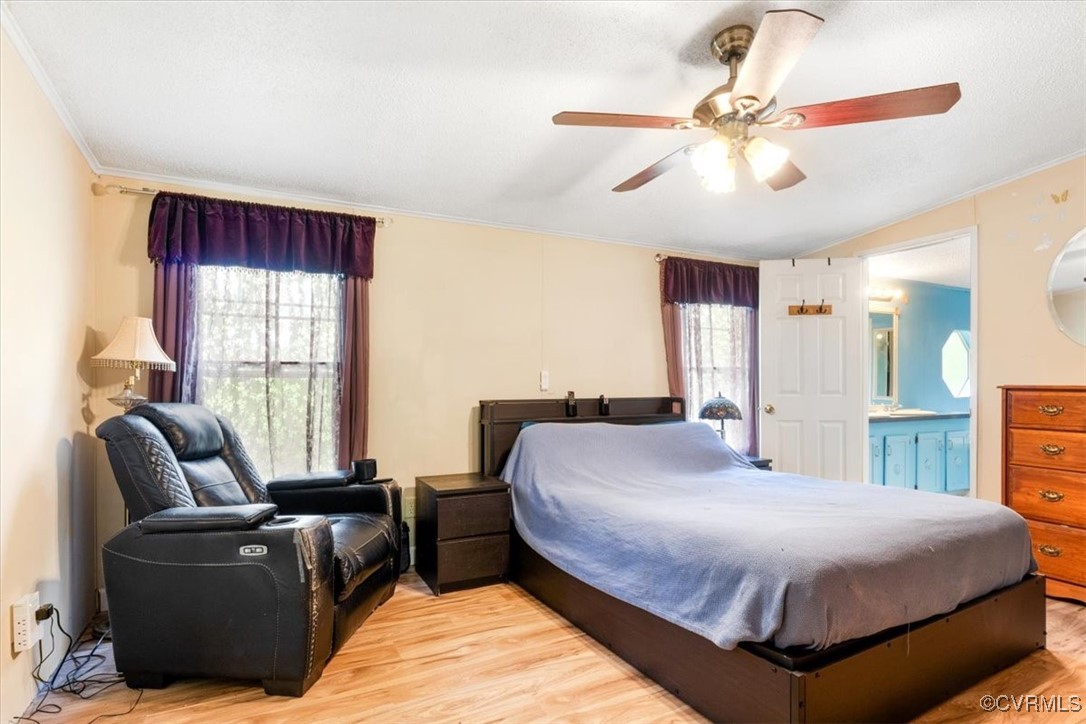 10340 Swift Road Partlow, VA 22534 - Photo 12 of 25 a bedroom with a bed couch and window