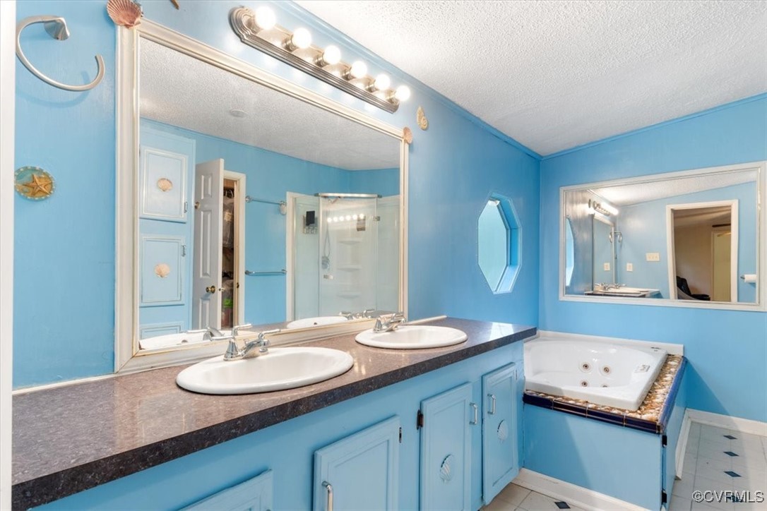 10340 Swift Road Partlow, VA 22534 - Photo 14 of 25 a bathroom with a sink double vanity and a mirror