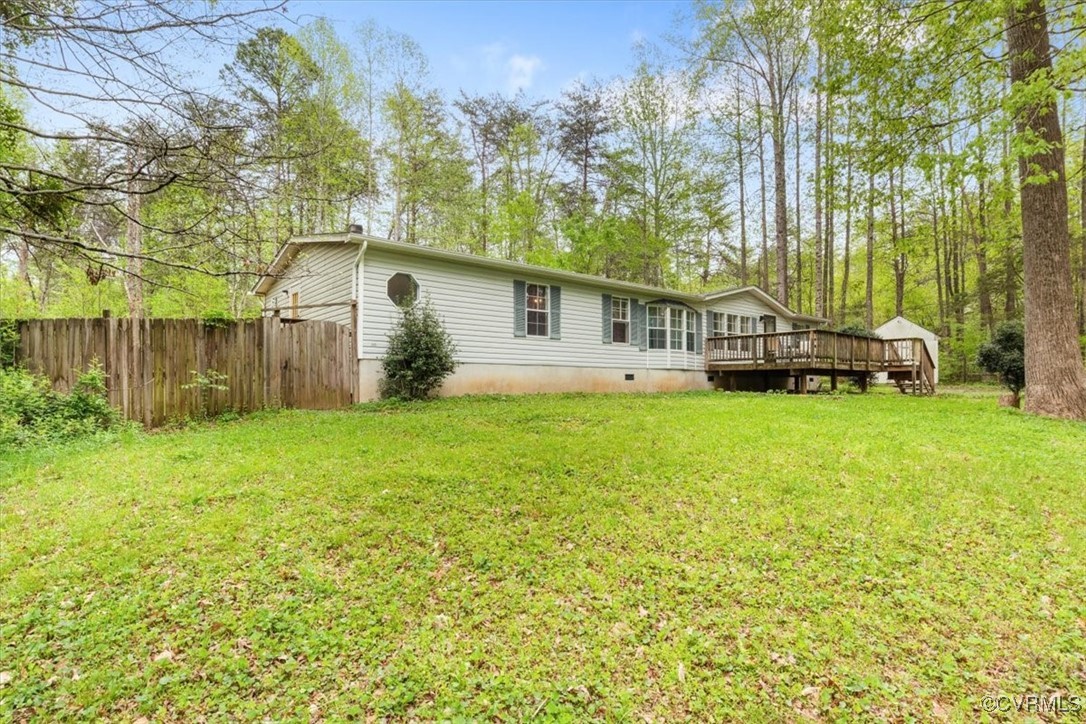 10340 Swift Road Partlow, VA 22534 - Photo 25 of 25 a view of house with yard and trees in the background