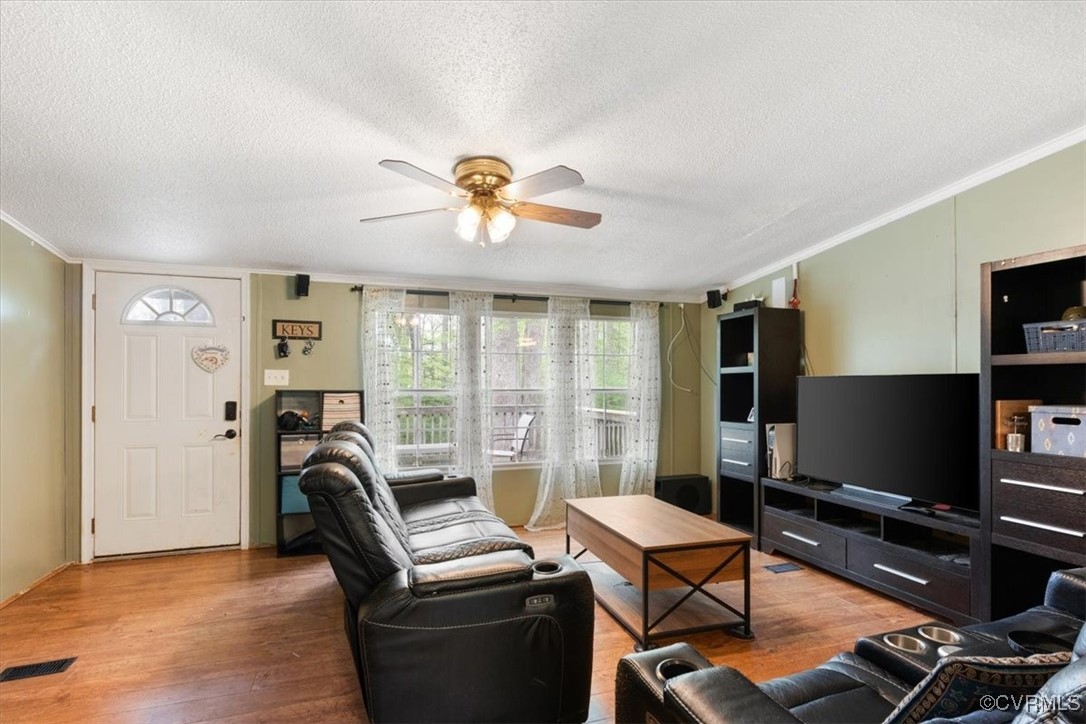 10340 Swift Road Partlow, VA 22534 - Photo 3 of 25 a living room with furniture and a flat screen tv