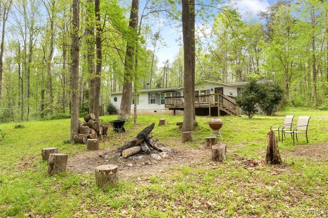 10340 Swift Road Partlow, VA 22534 - Photo 8 of 25 a view of a swimming pool and lounge chairs