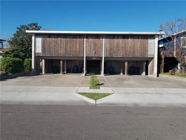 a house view with a garden space