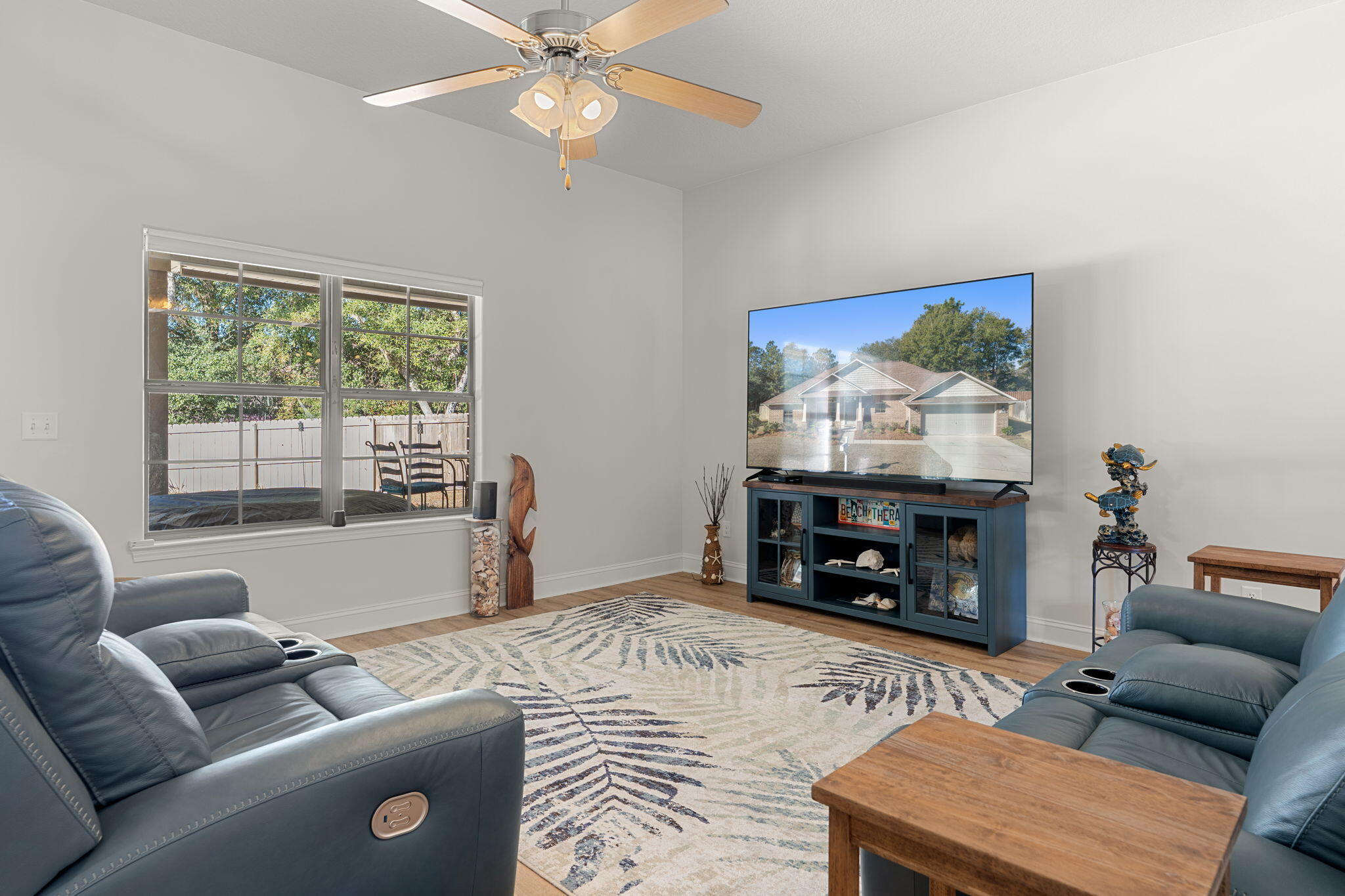 207 Pinque Coat Court Crestview, FL 32536 - Photo 11 of 47 a living room with furniture and a flat screen tv