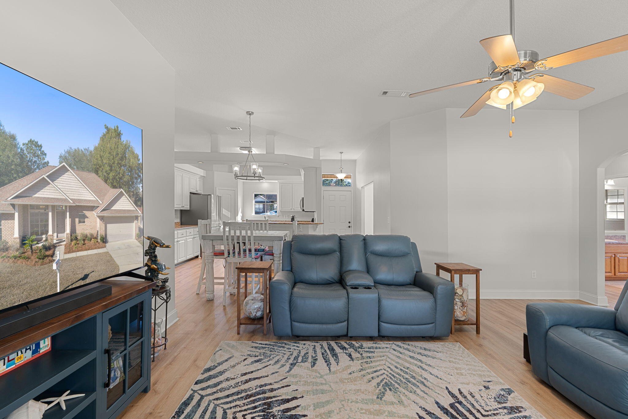 207 Pinque Coat Court Crestview, FL 32536 - Photo 13 of 47 a living room with furniture and a wooden floor