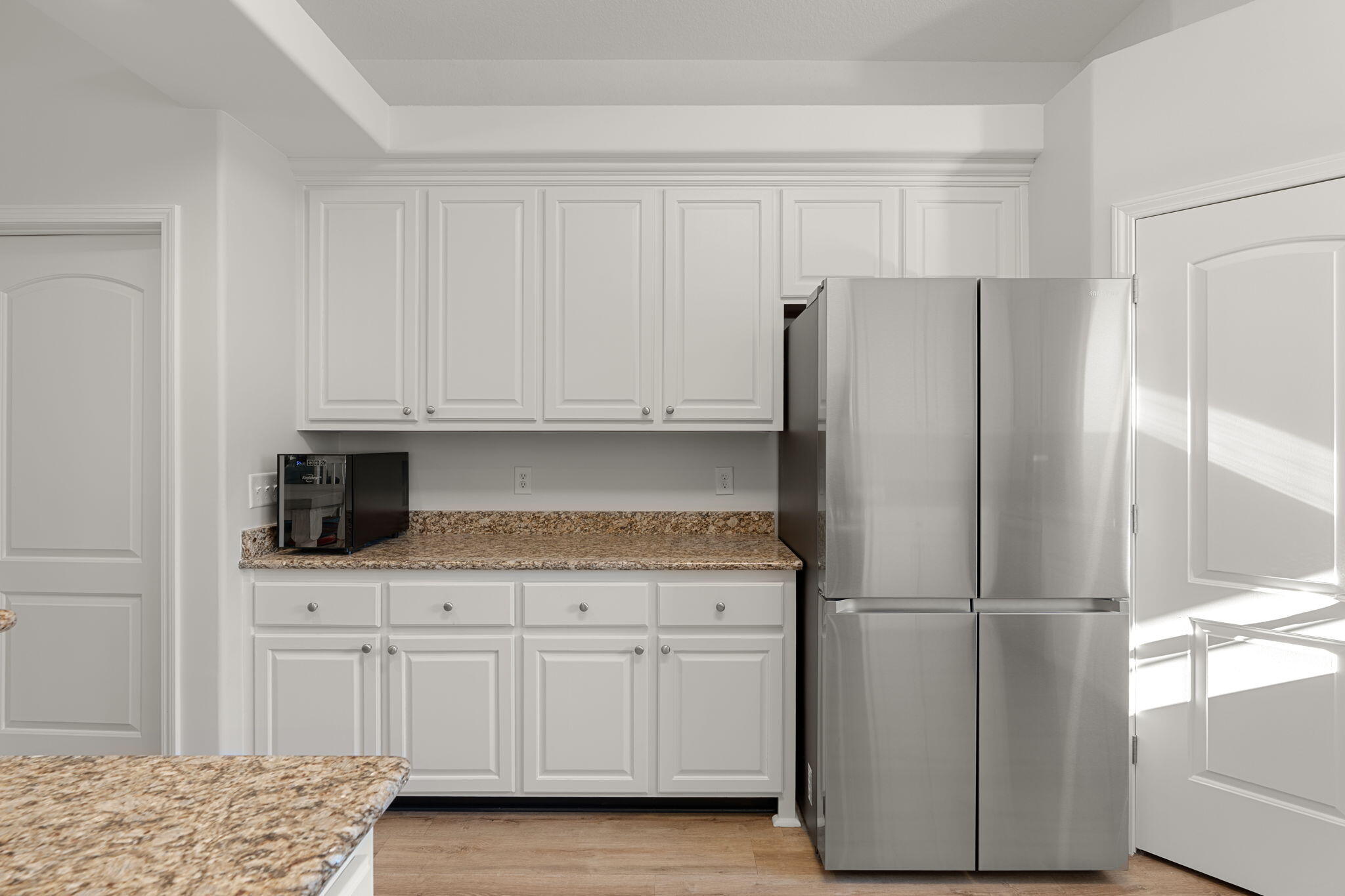 207 Pinque Coat Court Crestview, FL 32536 - Photo 20 of 47 a kitchen with stainless steel appliances white cabinets and a refrigerator