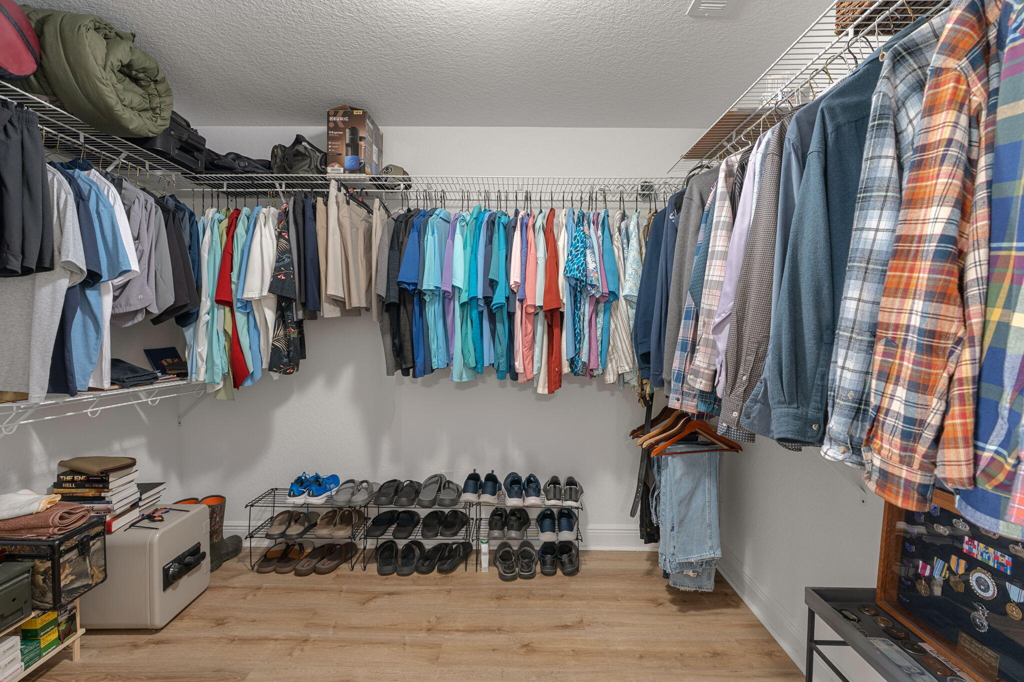 207 Pinque Coat Court Crestview, FL 32536 - Photo 26 of 47 a view of walk in closet with clothes and shoes
