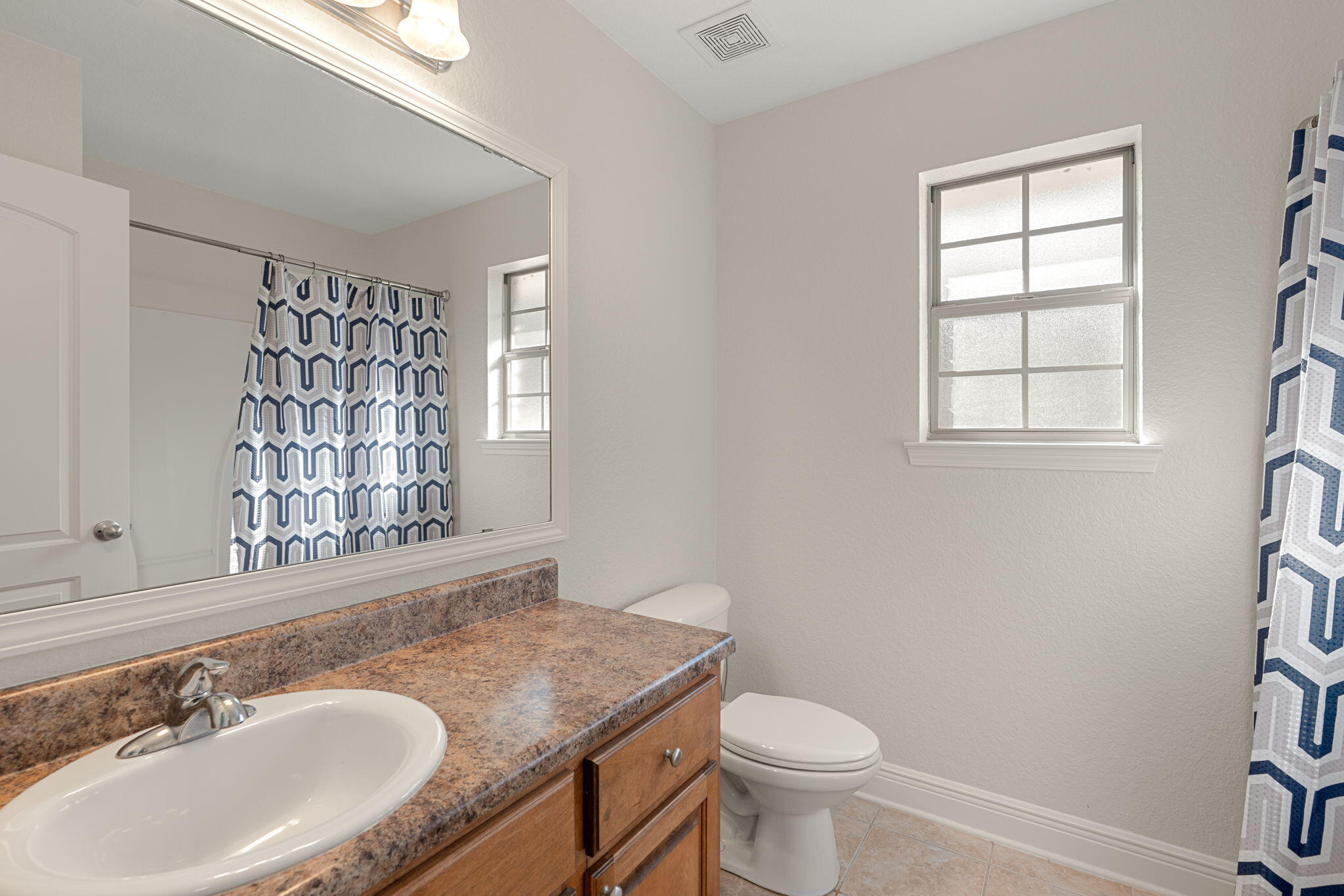 207 Pinque Coat Court Crestview, FL 32536 - Photo 33 of 47 a bathroom with a sink toilet and window
