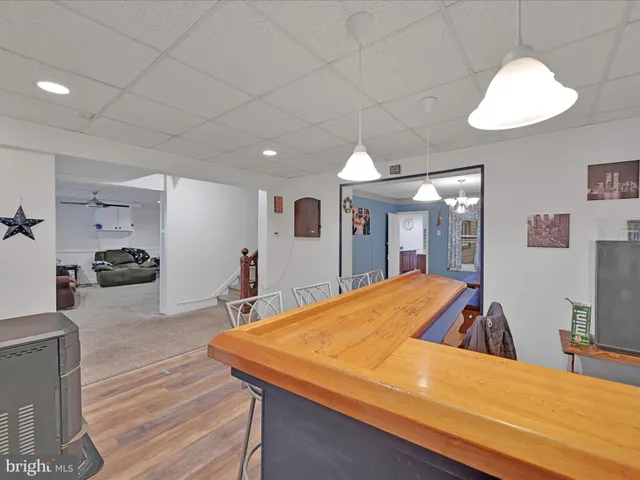 a room with a bed and a flat screen tv