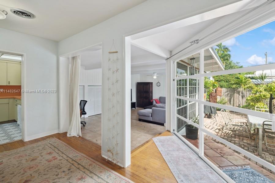 3531 Southwest 13th Street Miami, FL 33135 - Photo 12 of 25 a bedroom with furniture and a large window