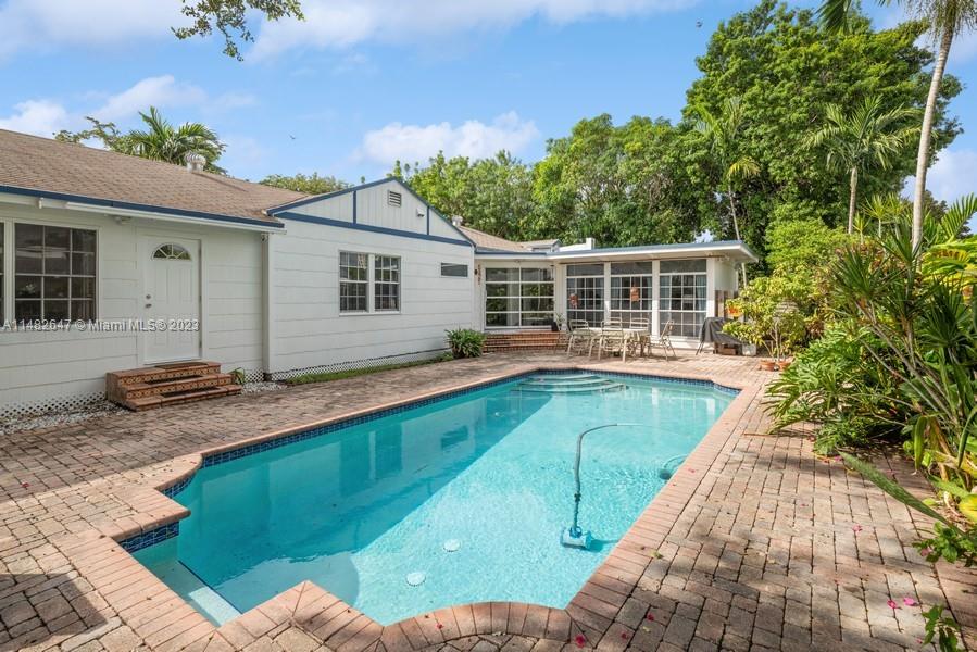 3531 Southwest 13th Street Miami, FL 33135 - Photo 18 of 25 a view of house with backyard and seating area