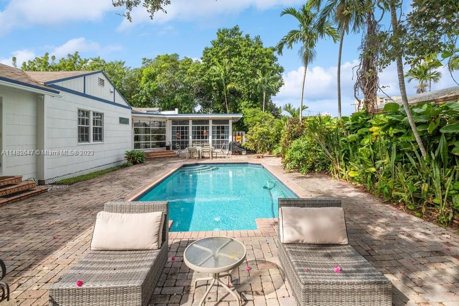 3531 Southwest 13th Street Miami, FL 33135 - Photo 19 of 25 a backyard of a house with seating space