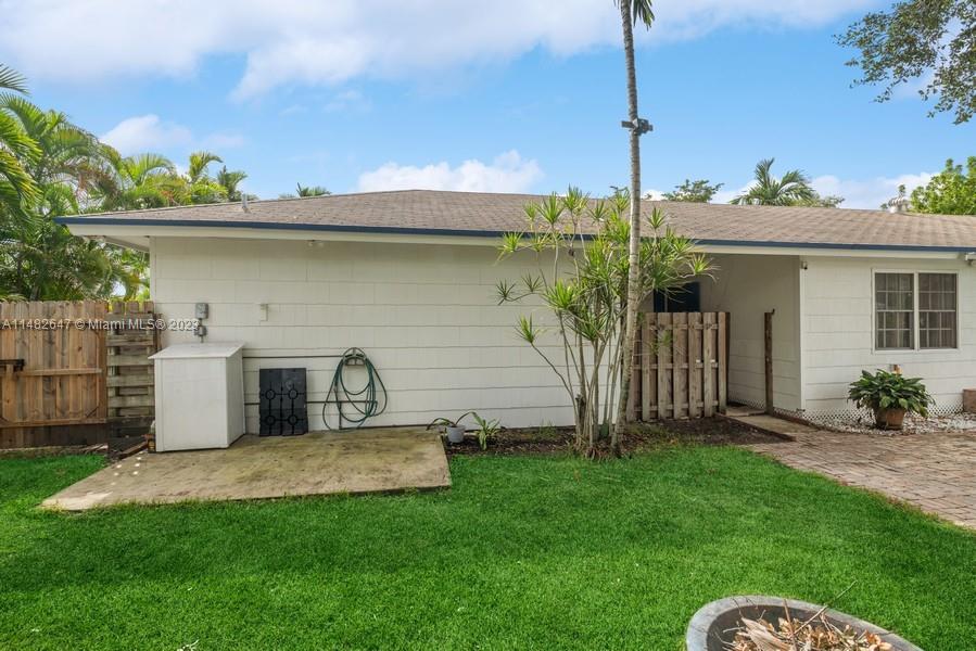 3531 Southwest 13th Street Miami, FL 33135 - Photo 21 of 25 a front view of a house with garden