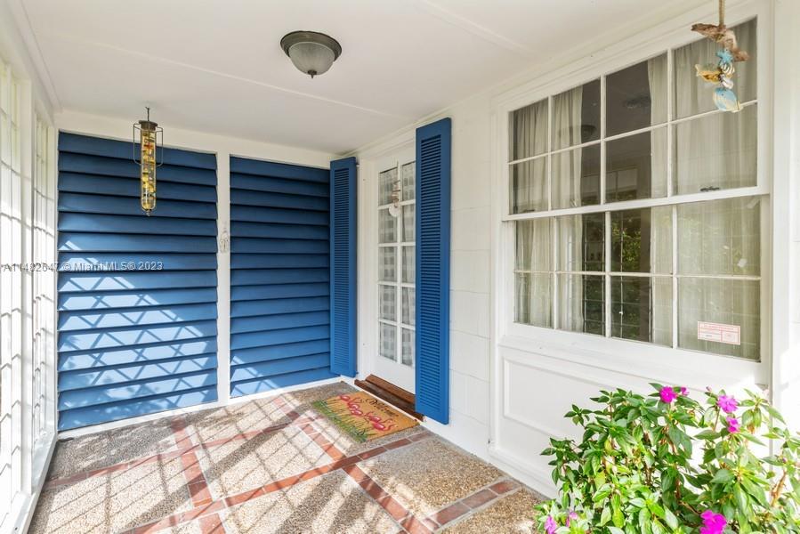 3531 Southwest 13th Street Miami, FL 33135 - Photo 3 of 25 a view of front door and bedroom