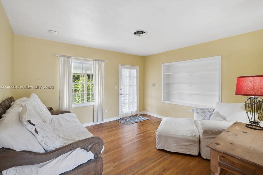 3531 Southwest 13th Street Miami, FL 33135 - Photo 5 of 25 a living room with furniture and a window