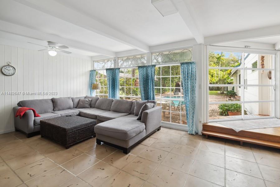 3531 Southwest 13th Street Miami, FL 33135 - Photo 9 of 25 a living room with furniture and a large window