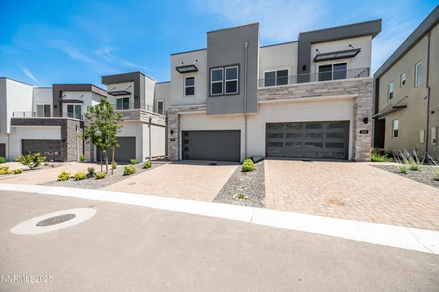 a front view of a house with yard