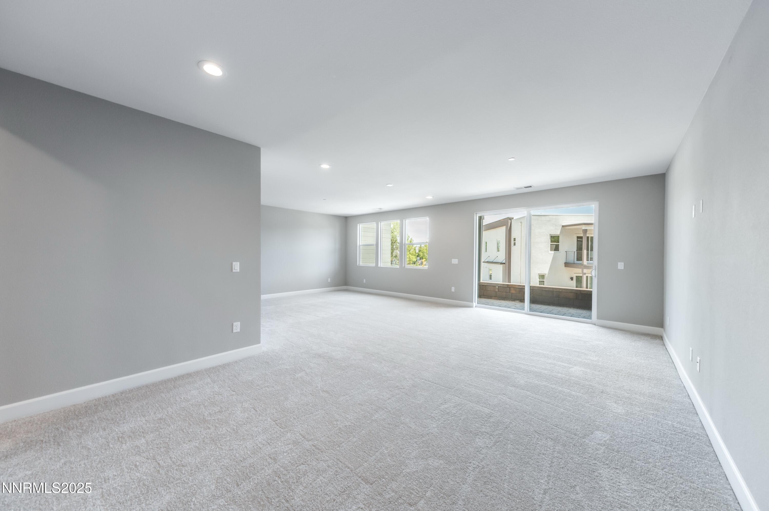 1517 Golf Club Drive Reno, NV 89519 - Photo 22 of 49 a view of an empty room with closet and wooden floor