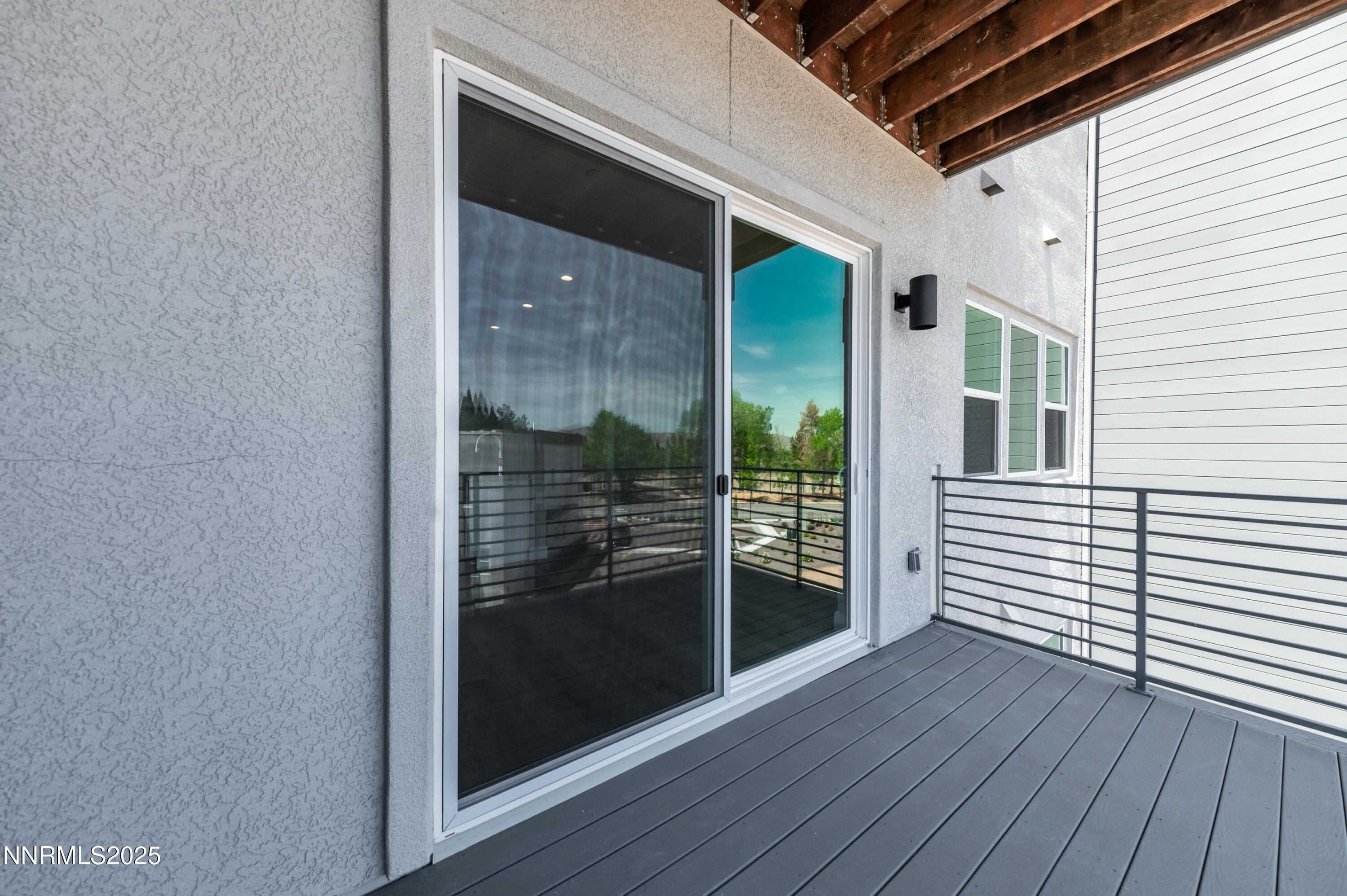 1517 Golf Club Drive Reno, NV 89519 - Photo 26 of 49 a view of a porch with wooden floor and a window