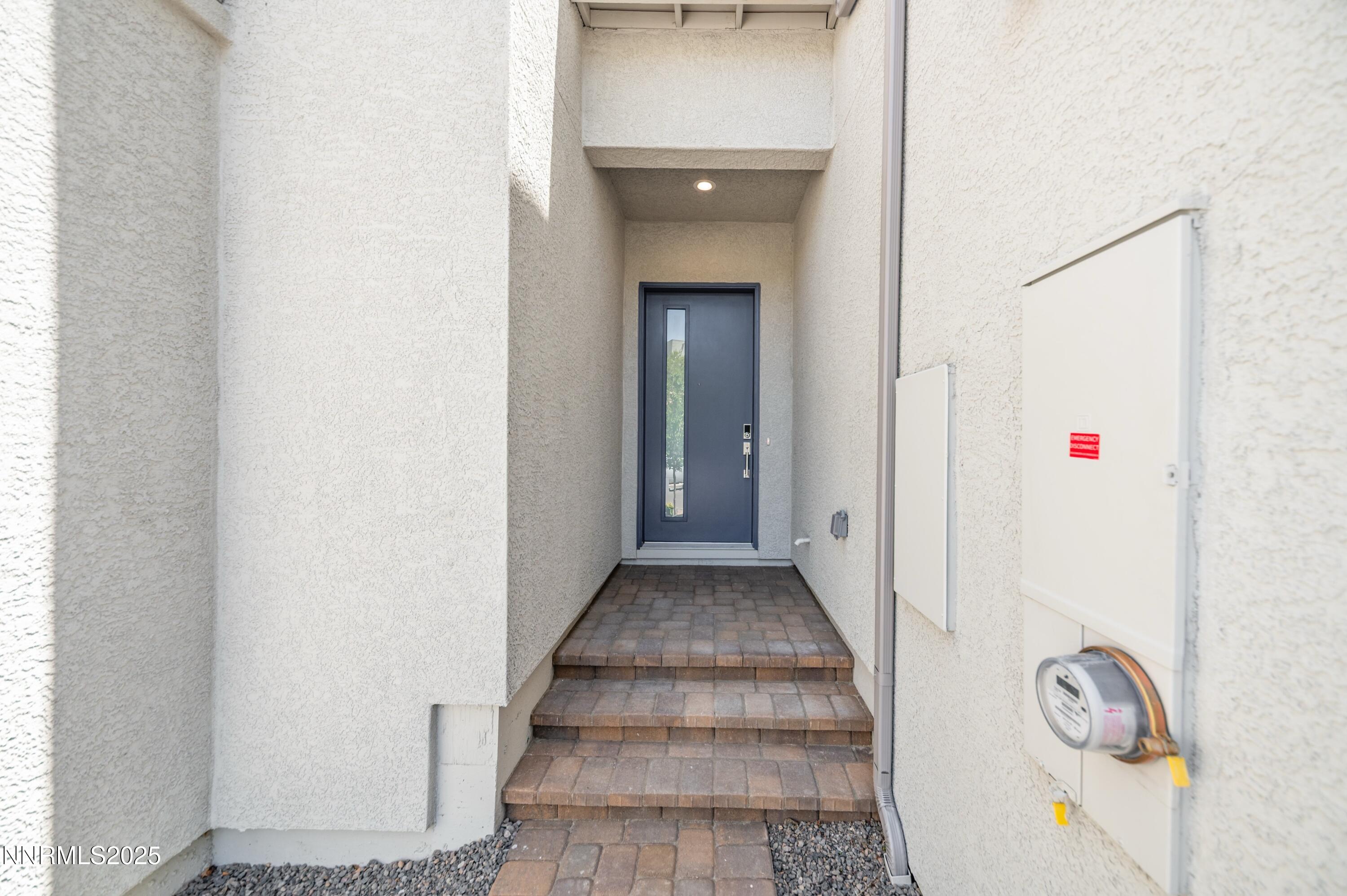 1517 Golf Club Drive Reno, NV 89519 - Photo 3 of 49 a view of a hallway with wooden floor
