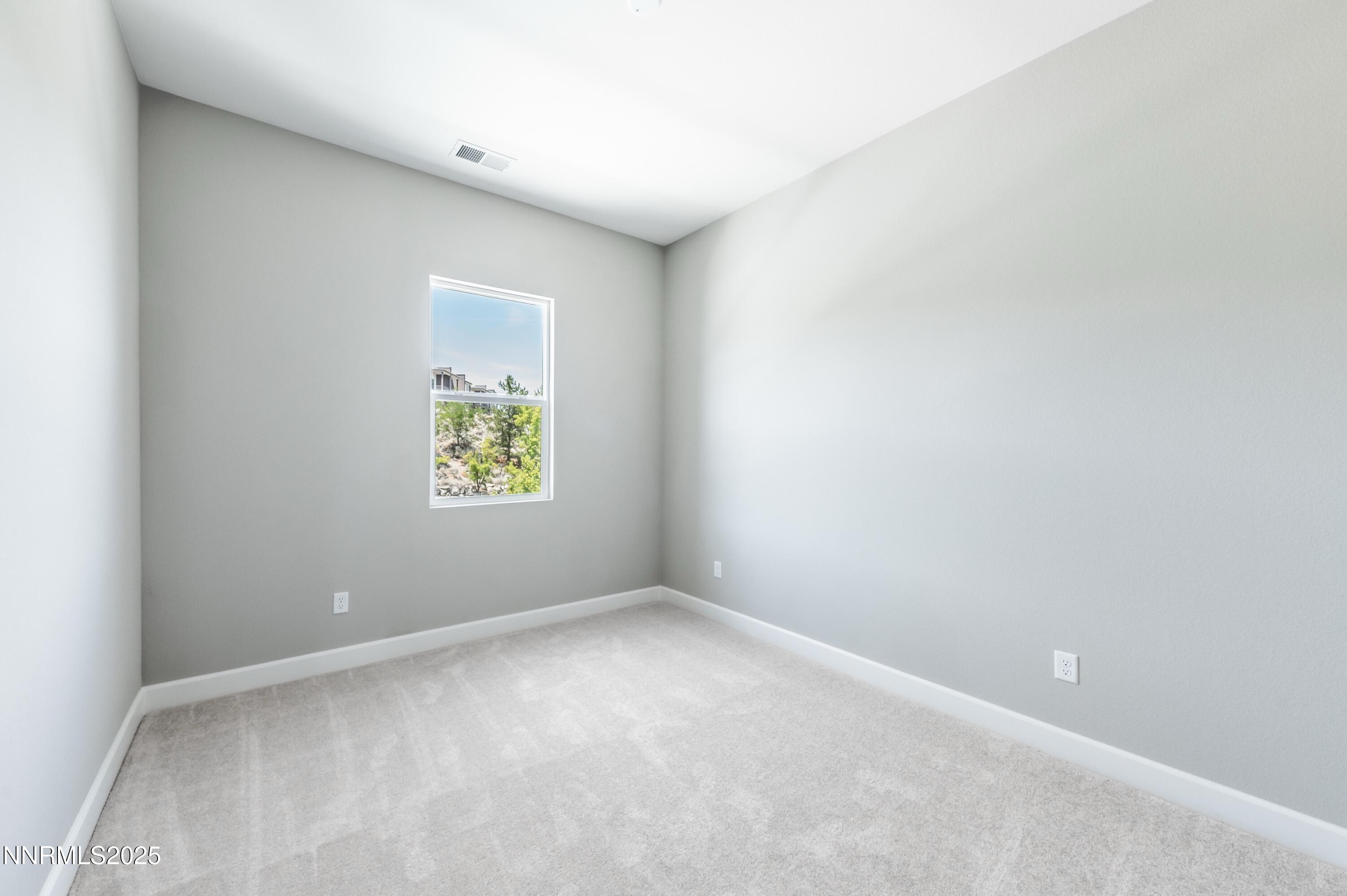 1517 Golf Club Drive Reno, NV 89519 - Photo 31 of 49 an empty room with windows