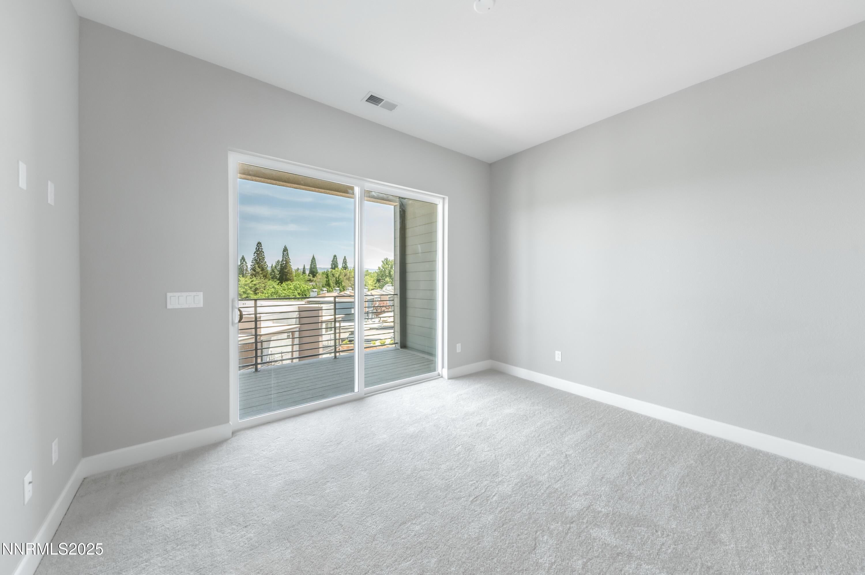 1517 Golf Club Drive Reno, NV 89519 - Photo 40 of 49 a view of an empty room with a window