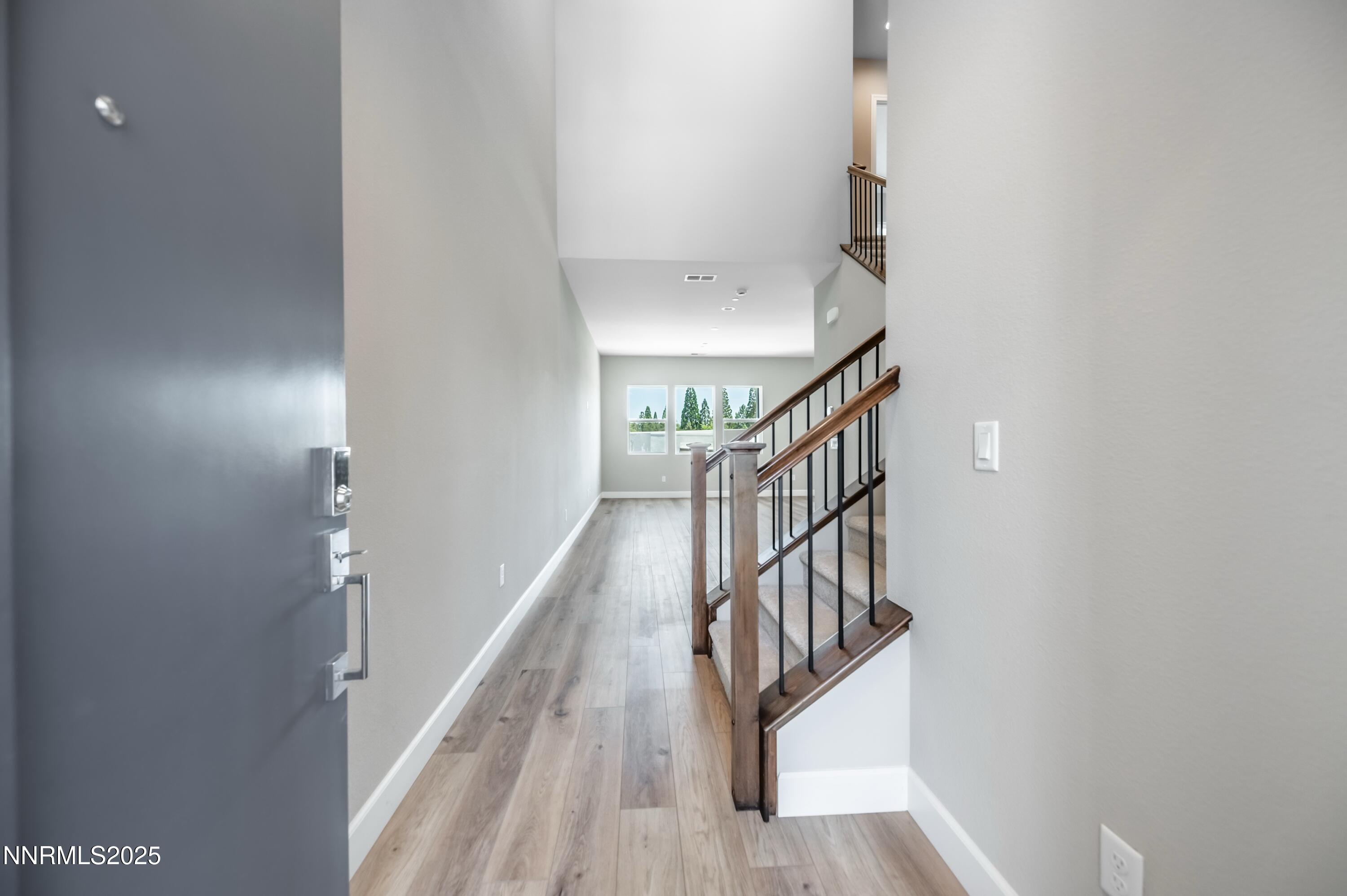 1517 Golf Club Drive Reno, NV 89519 - Photo 4 of 49 a view of entryway and hall with wooden floor