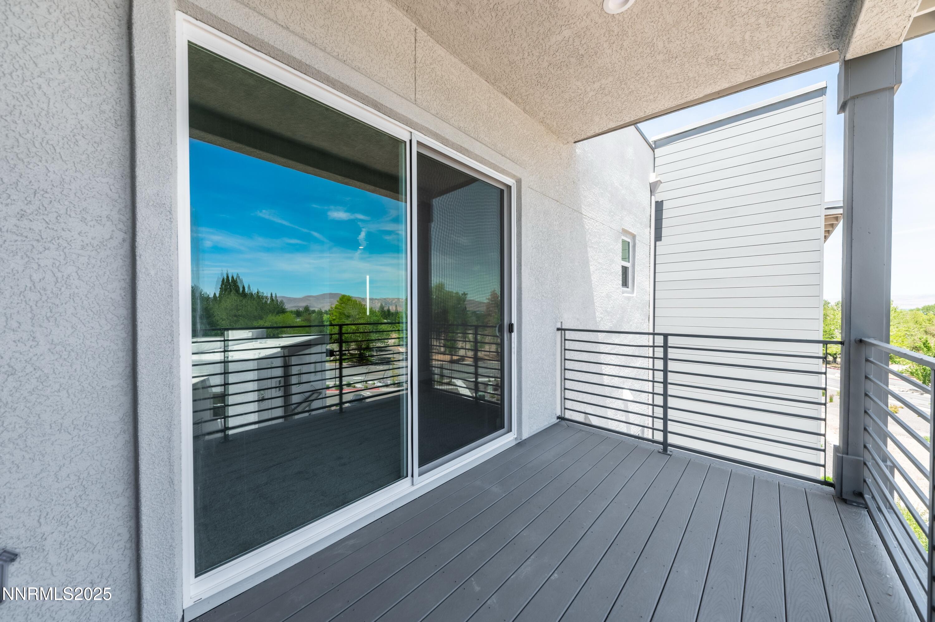 1517 Golf Club Drive Reno, NV 89519 - Photo 43 of 49 a view of a balcony with wooden floor