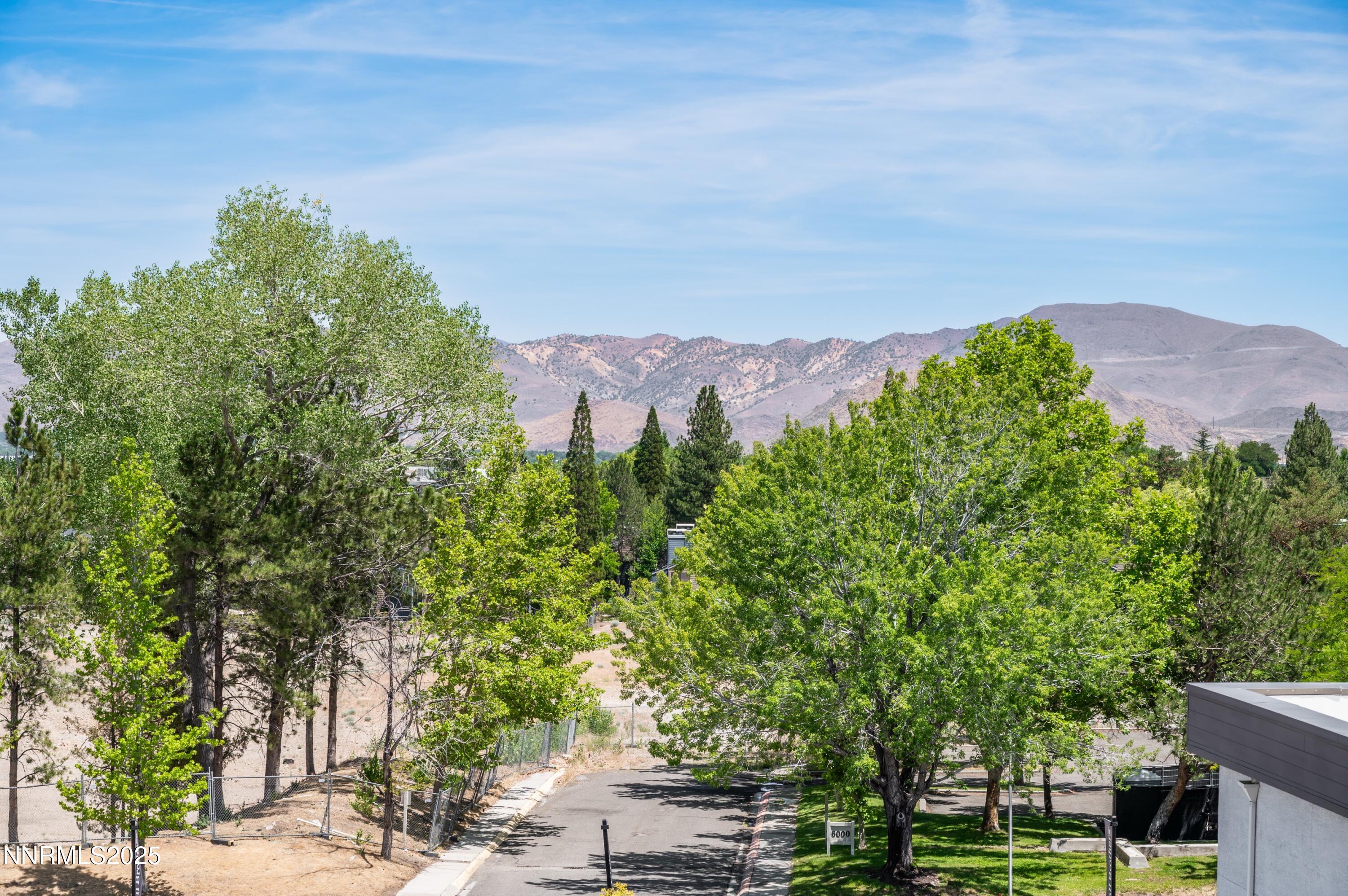 1517 Golf Club Drive Reno, NV 89519 - Photo 49 of 49 a view of a lake with a mountain in the background