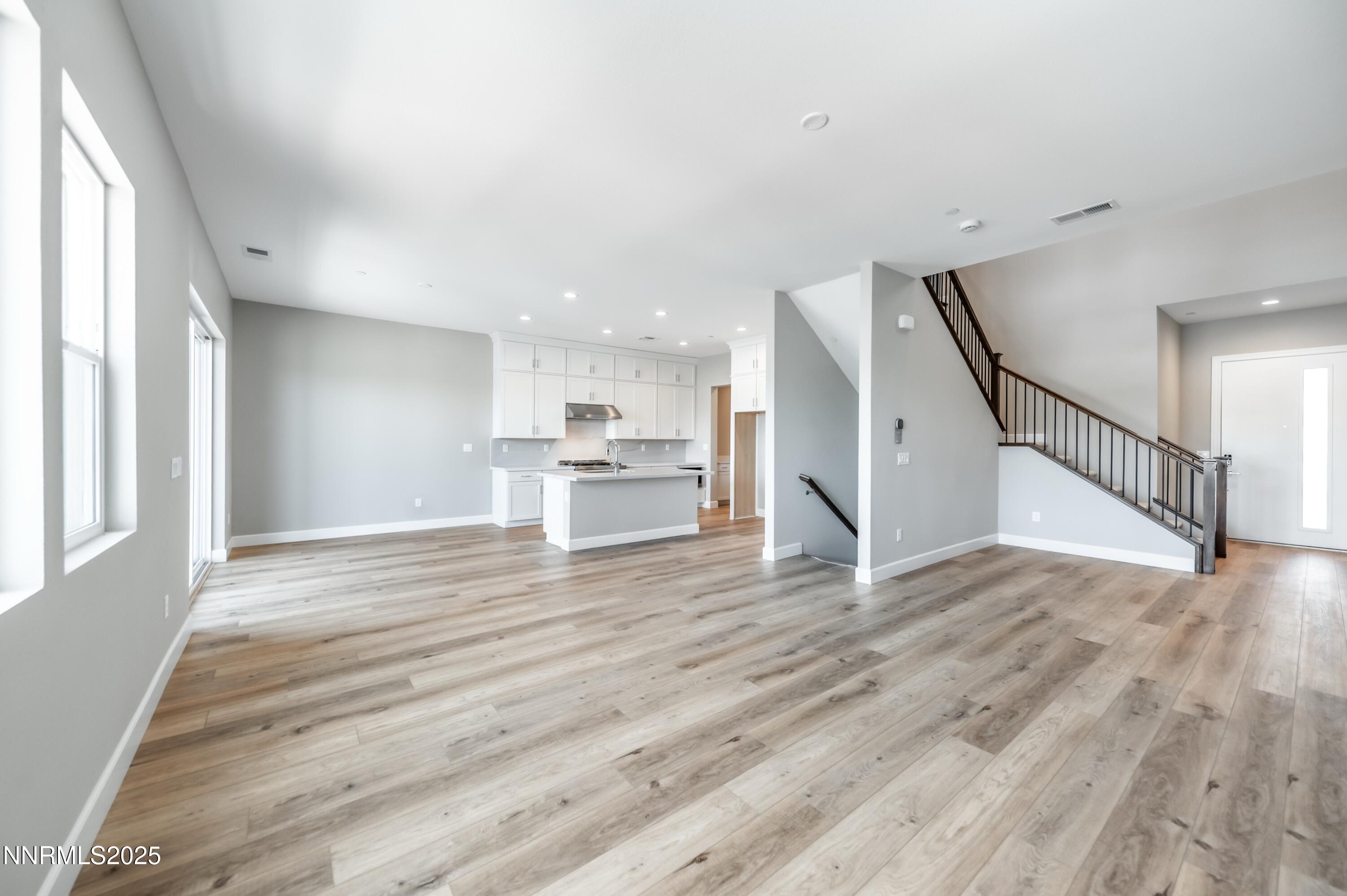 1517 Golf Club Drive Reno, NV 89519 - Photo 8 of 49 a view of kitchen and hall with wooden floor