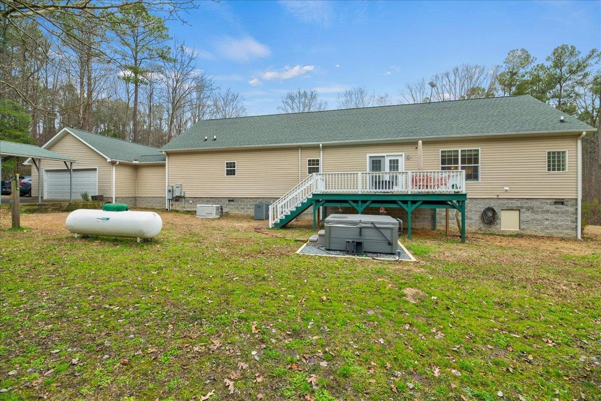 433 Scott Road Cameron, NC 28326 - Photo 38 of 55 a front view of a house with a yard and garage
