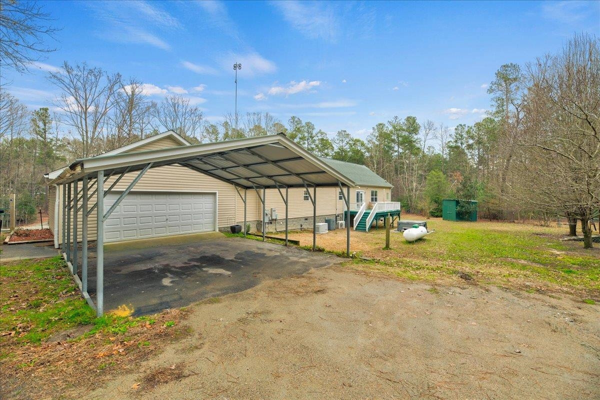 433 Scott Road Cameron, NC 28326 - Photo 39 of 55 a view of a house with a yard