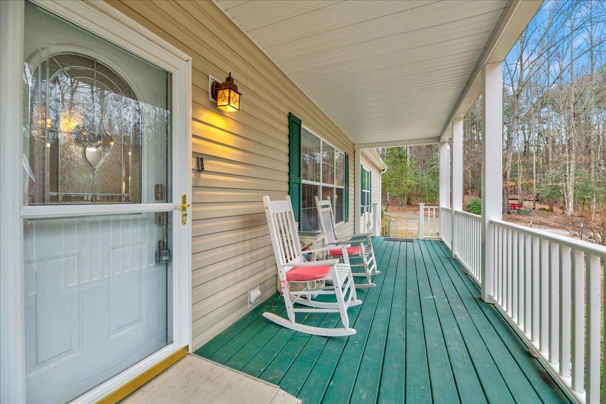 433 Scott Road Cameron, NC 28326 - Photo 4 of 55 a balcony view with a sitting space
