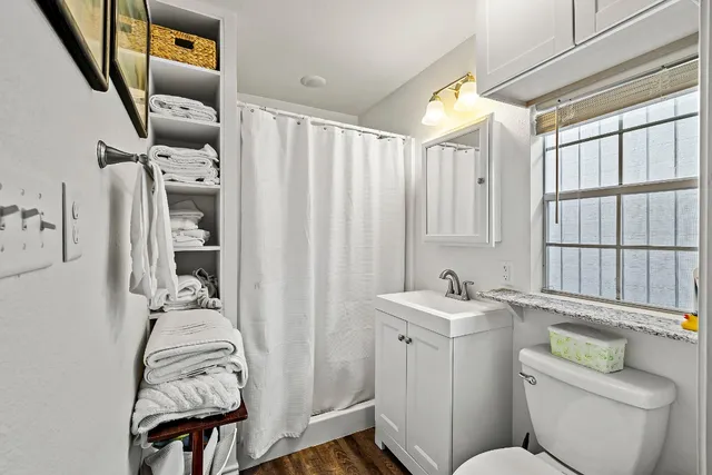 a view of a storage & utility room with a washer dryer