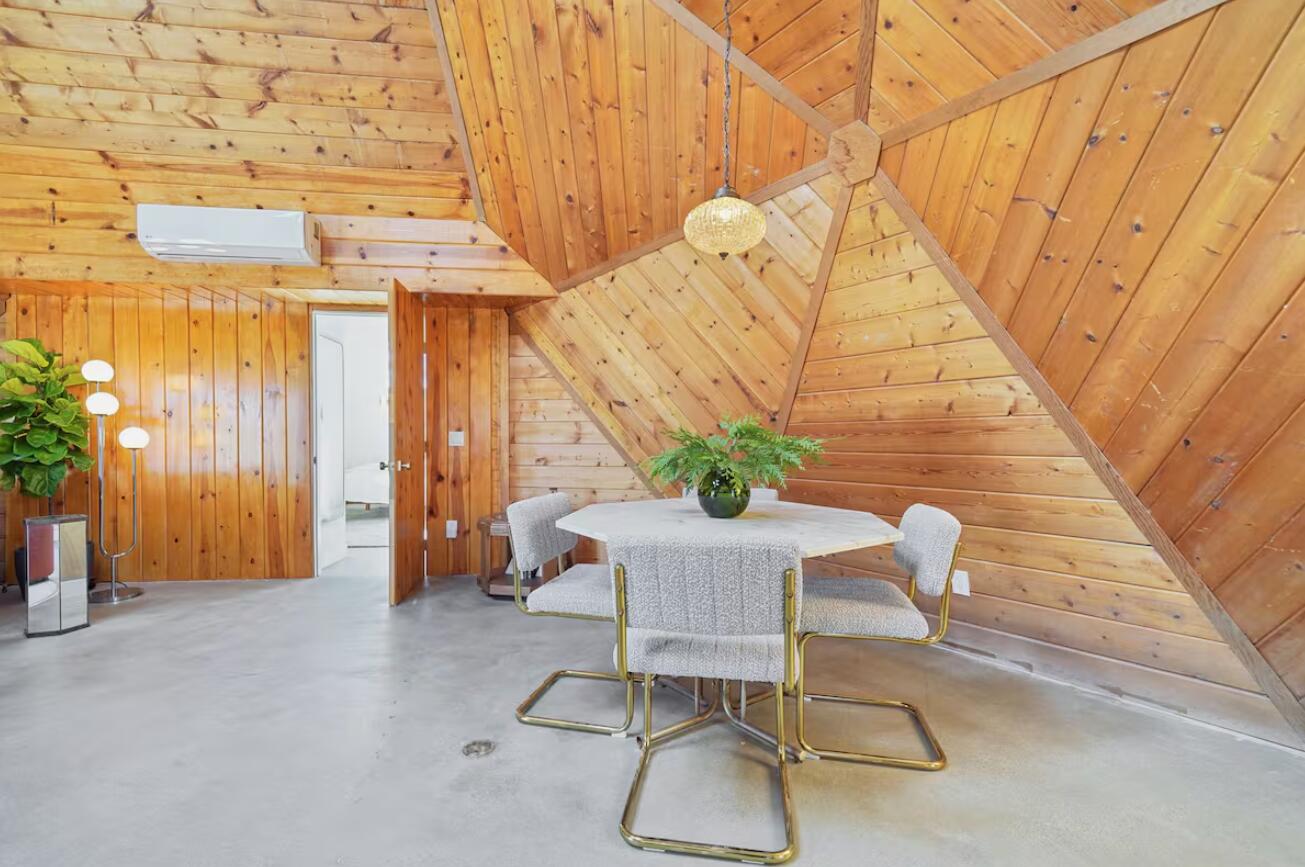 59727 Sharp Terrace Drive Yucca Valley, CA 92284 - Photo 16 of 38 a view of a room with furniture and wooden floor