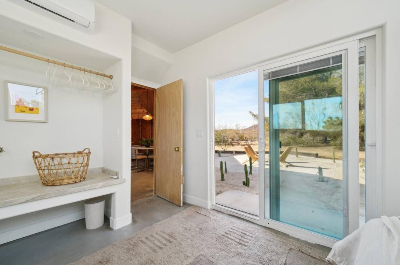 59727 Sharp Terrace Drive Yucca Valley, CA 92284 - Photo 22 of 38 a view of livingroom with furniture and window