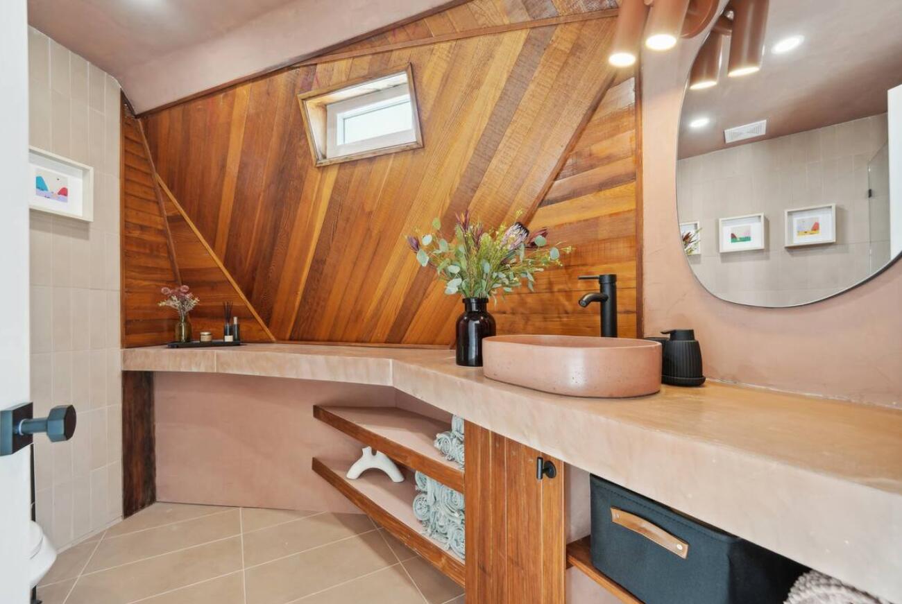 59727 Sharp Terrace Drive Yucca Valley, CA 92284 - Photo 25 of 38 a view of a bathroom with a sink and a mirror