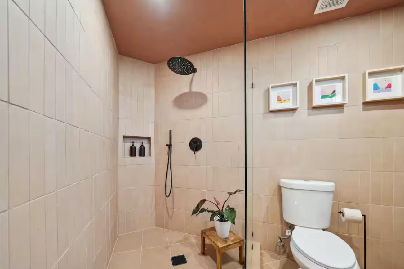 59727 Sharp Terrace Drive Yucca Valley, CA 92284 - Photo 26 of 38 a bathroom with a toilet and a shower