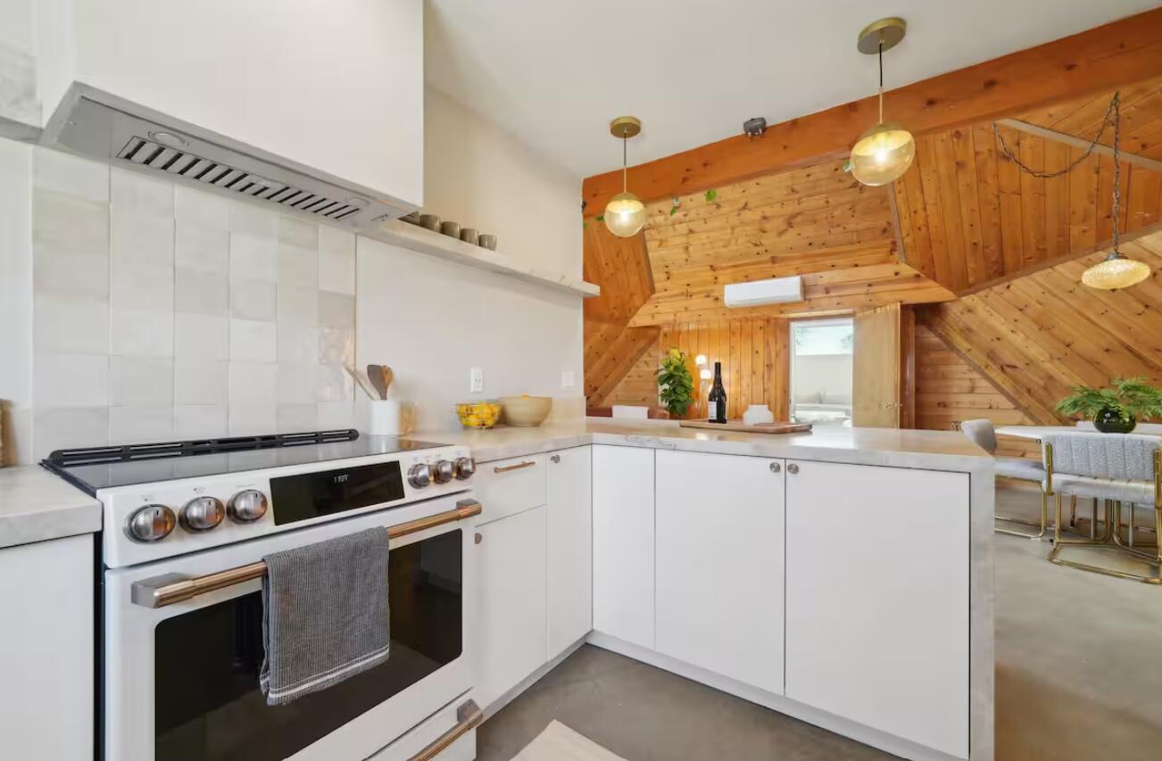 59727 Sharp Terrace Drive Yucca Valley, CA 92284 - Photo 10 of 38 a kitchen with appliances a sink and cabinets