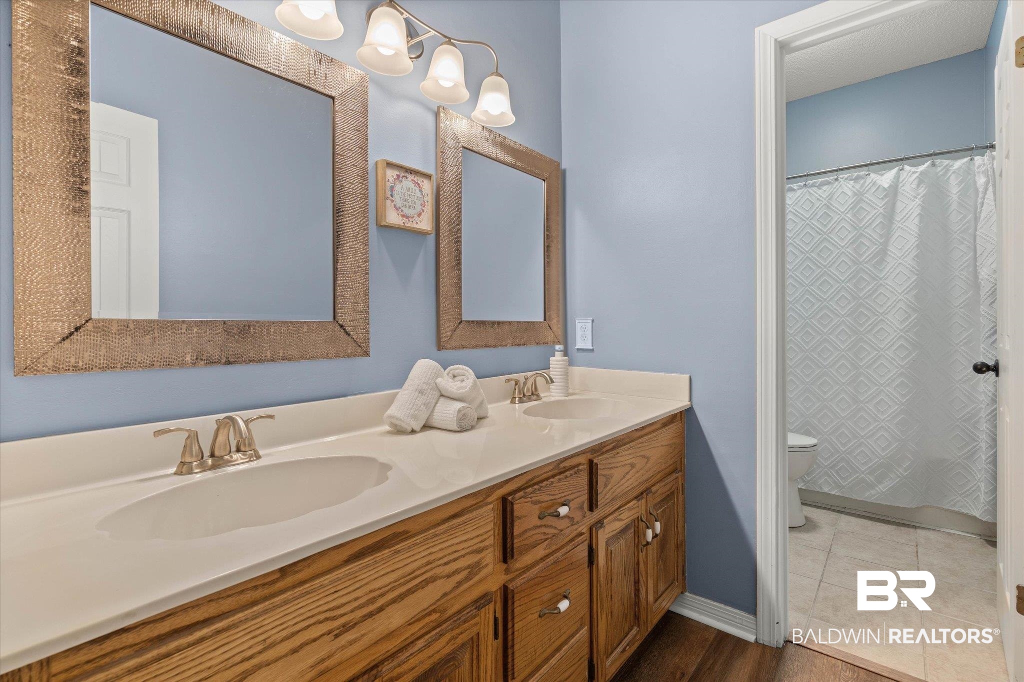 1640 Aden Road Mobile, AL 36695 - Photo 11 of 20 Bathroom featuring toilet and double vanity