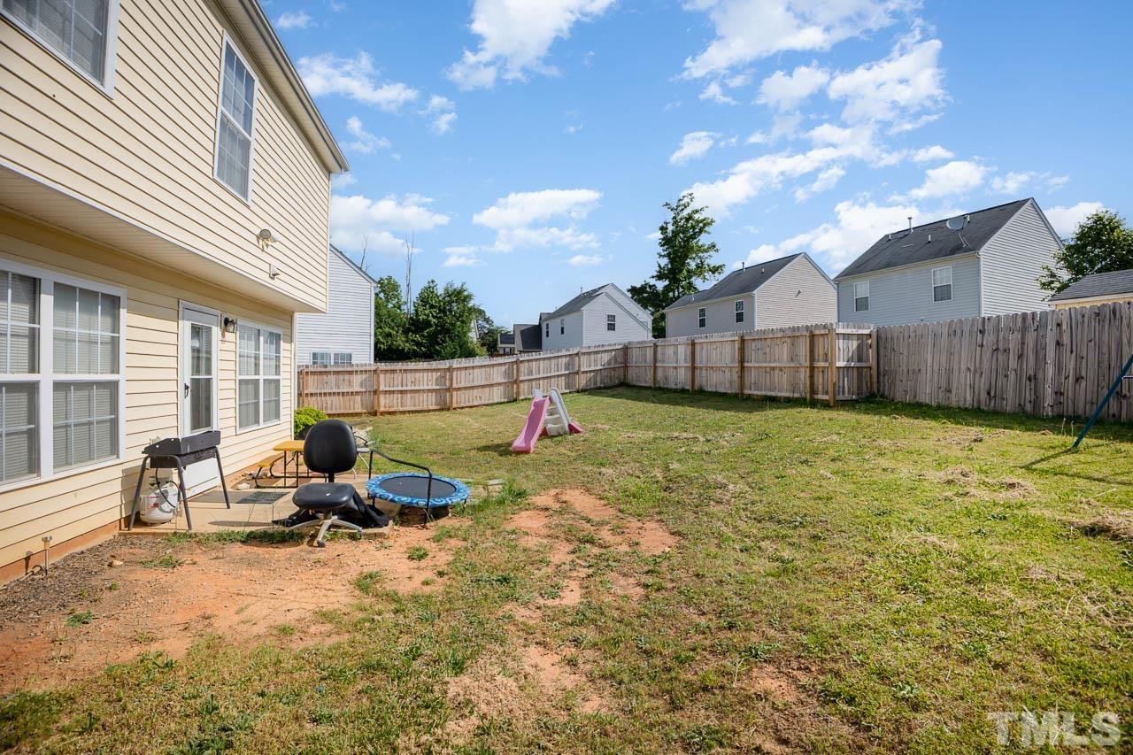 3413 Colossae Court Raleigh, NC 27610 - Photo 6 of 21 a view of a house with backyard and sitting area