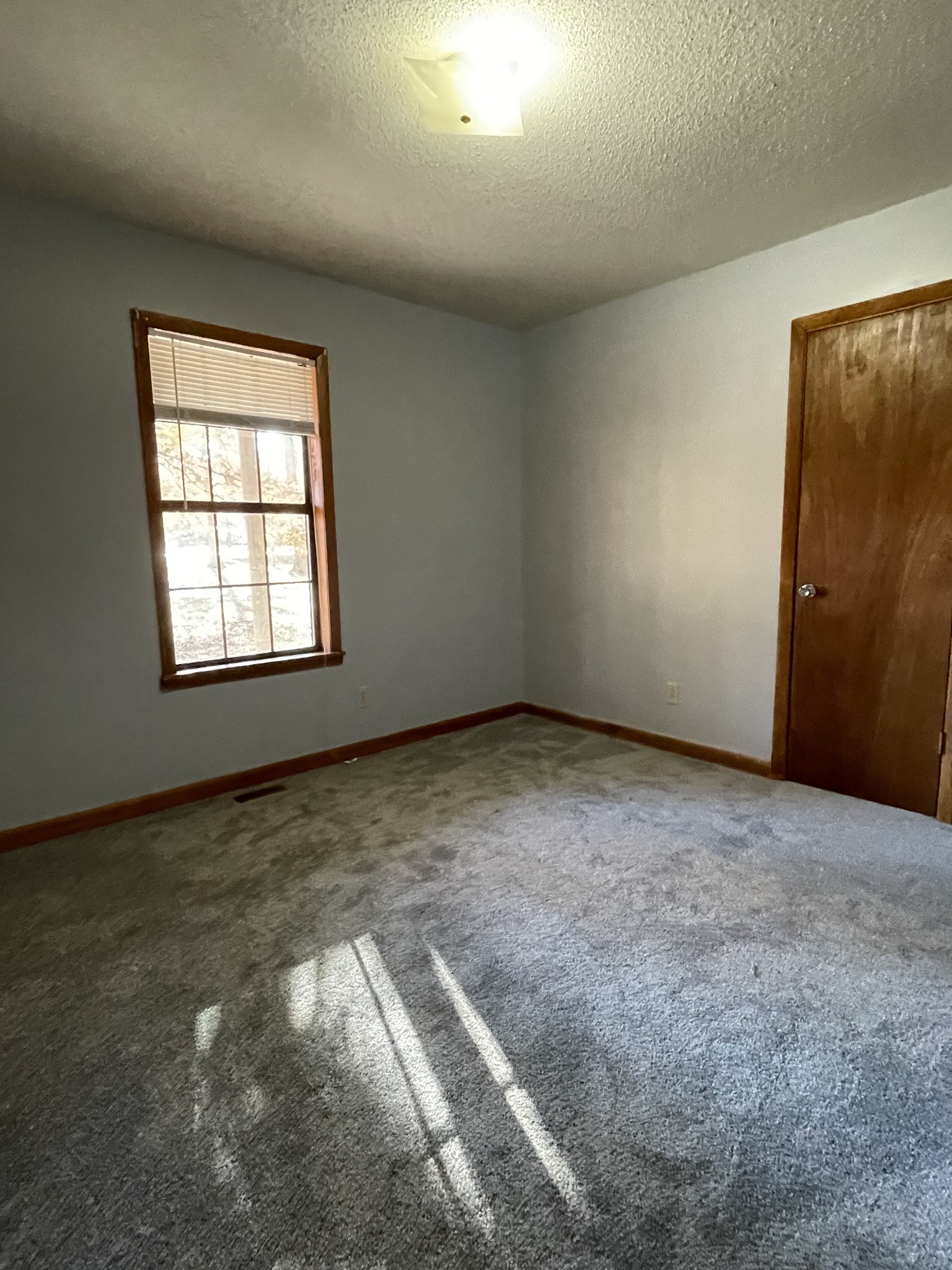 470 Cat Creek Road Manchester, TN 37355 - Photo 16 of 20 a view of an empty room with a window