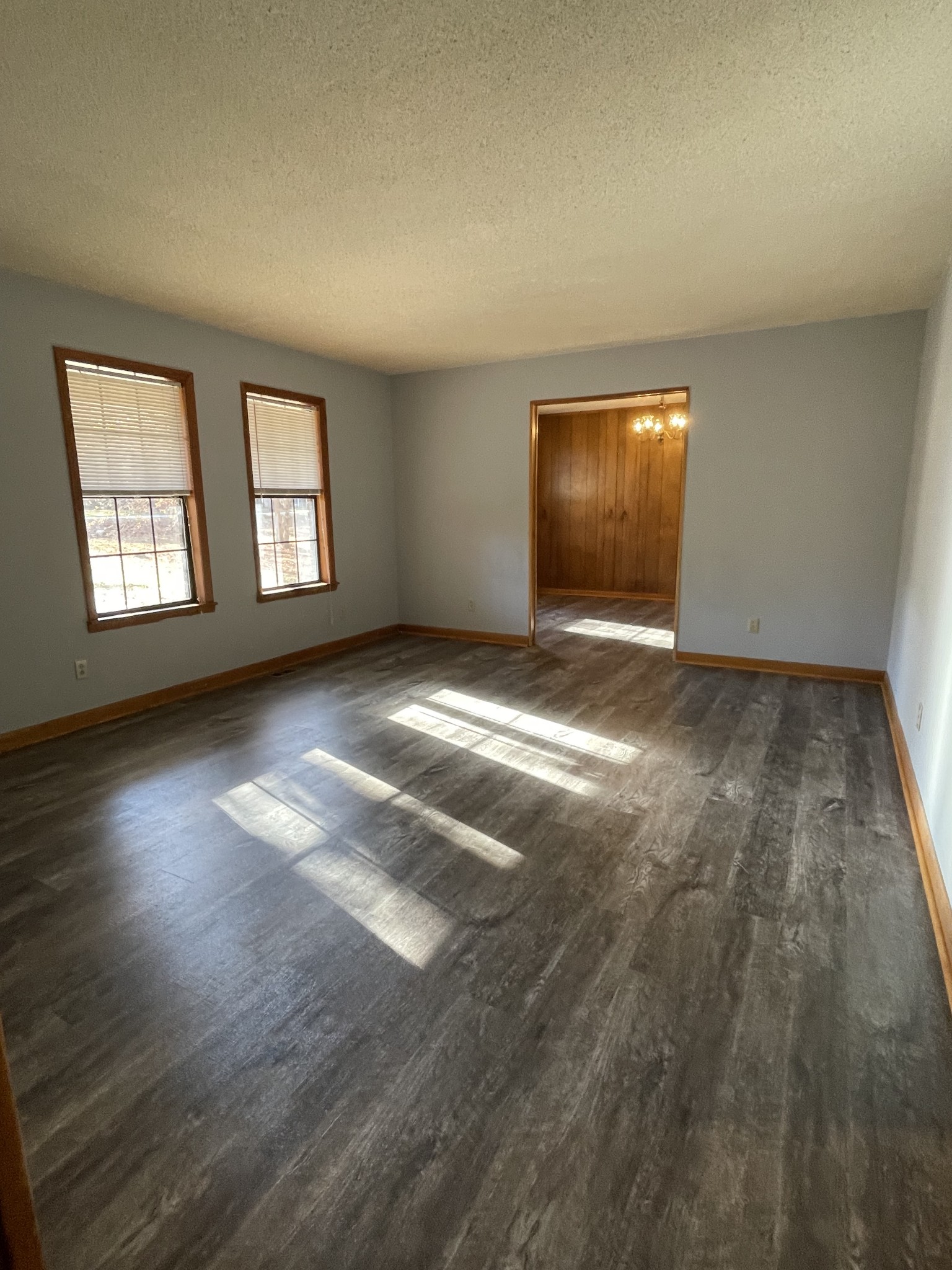 470 Cat Creek Road Manchester, TN 37355 - Photo 2 of 20 a view of an empty room with window and wooden floor