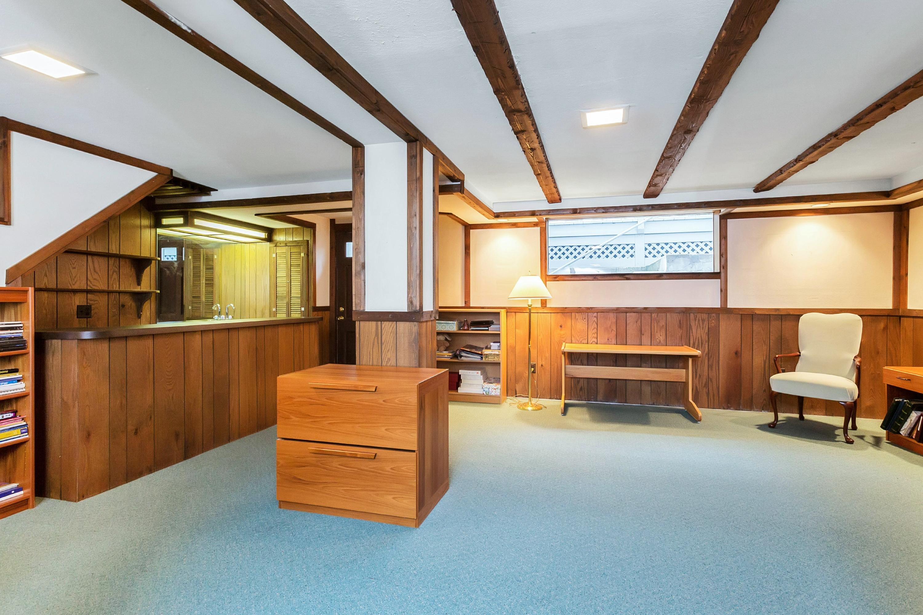 5 Meadow Road Darien, CT 06820 - Photo 11 of 25 a reading room with wooden floor and furniture