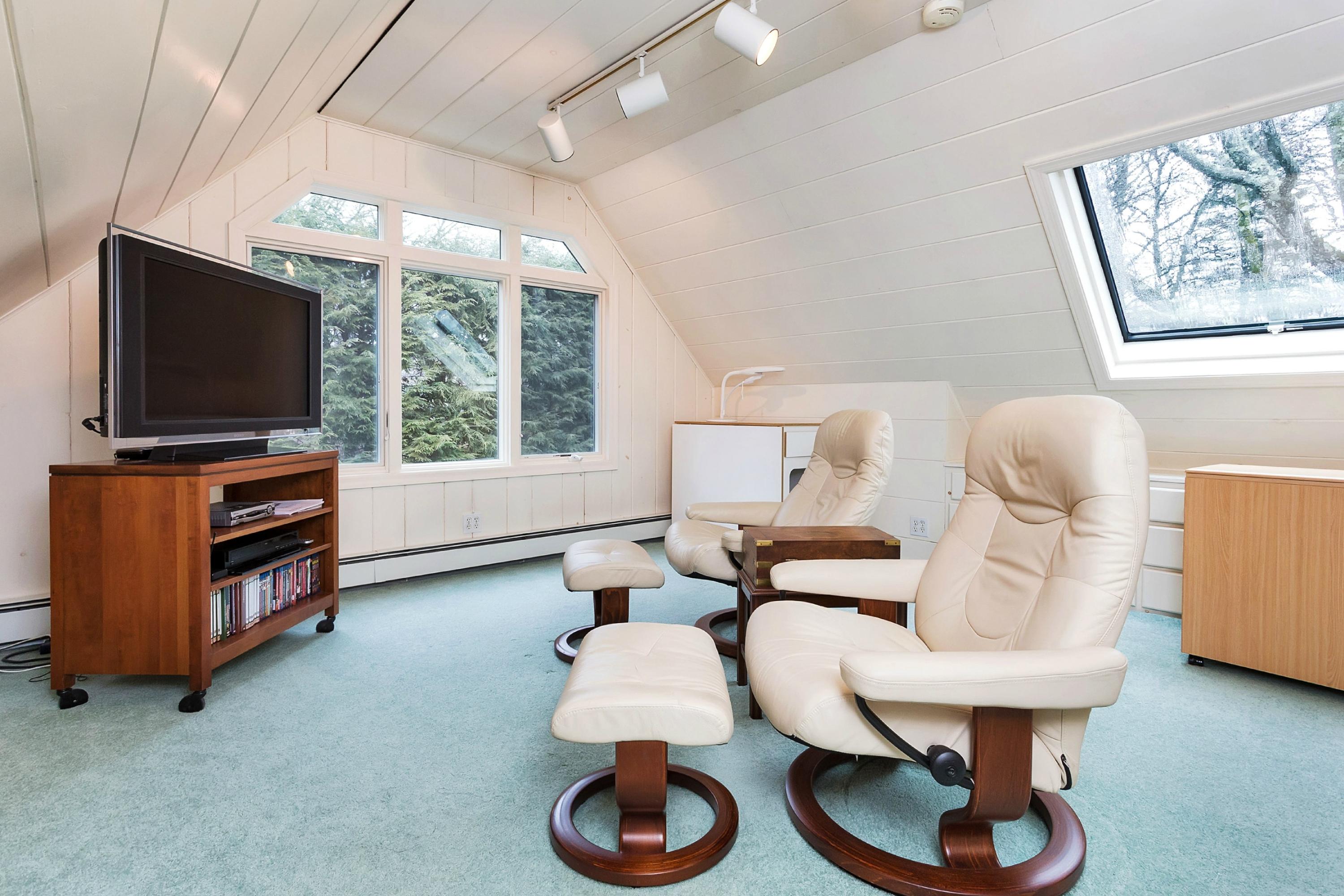 5 Meadow Road Darien, CT 06820 - Photo 17 of 25 a living room with furniture and a flat screen tv