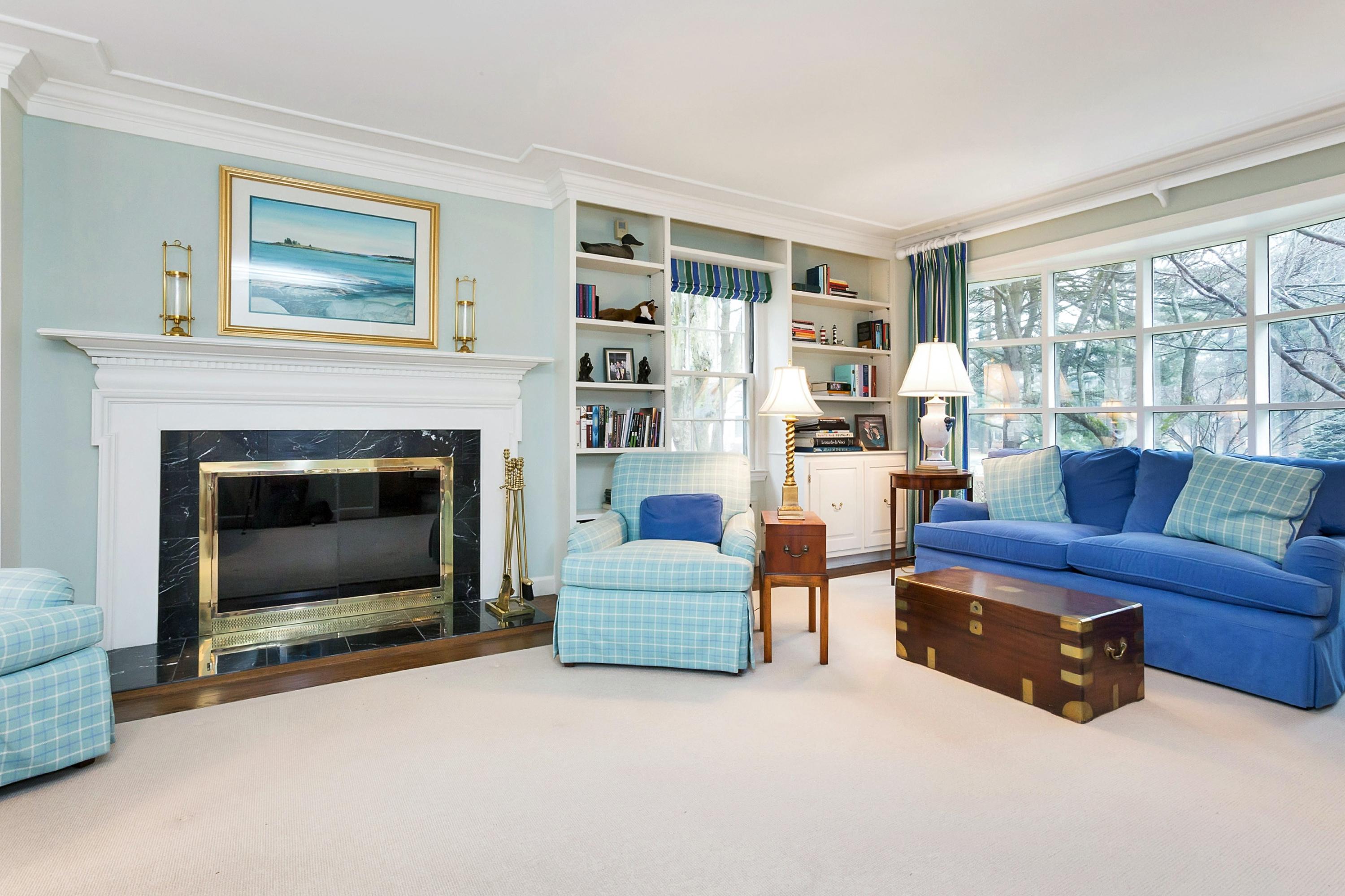 5 Meadow Road Darien, CT 06820 - Photo 3 of 25 a living room with furniture and a fireplace