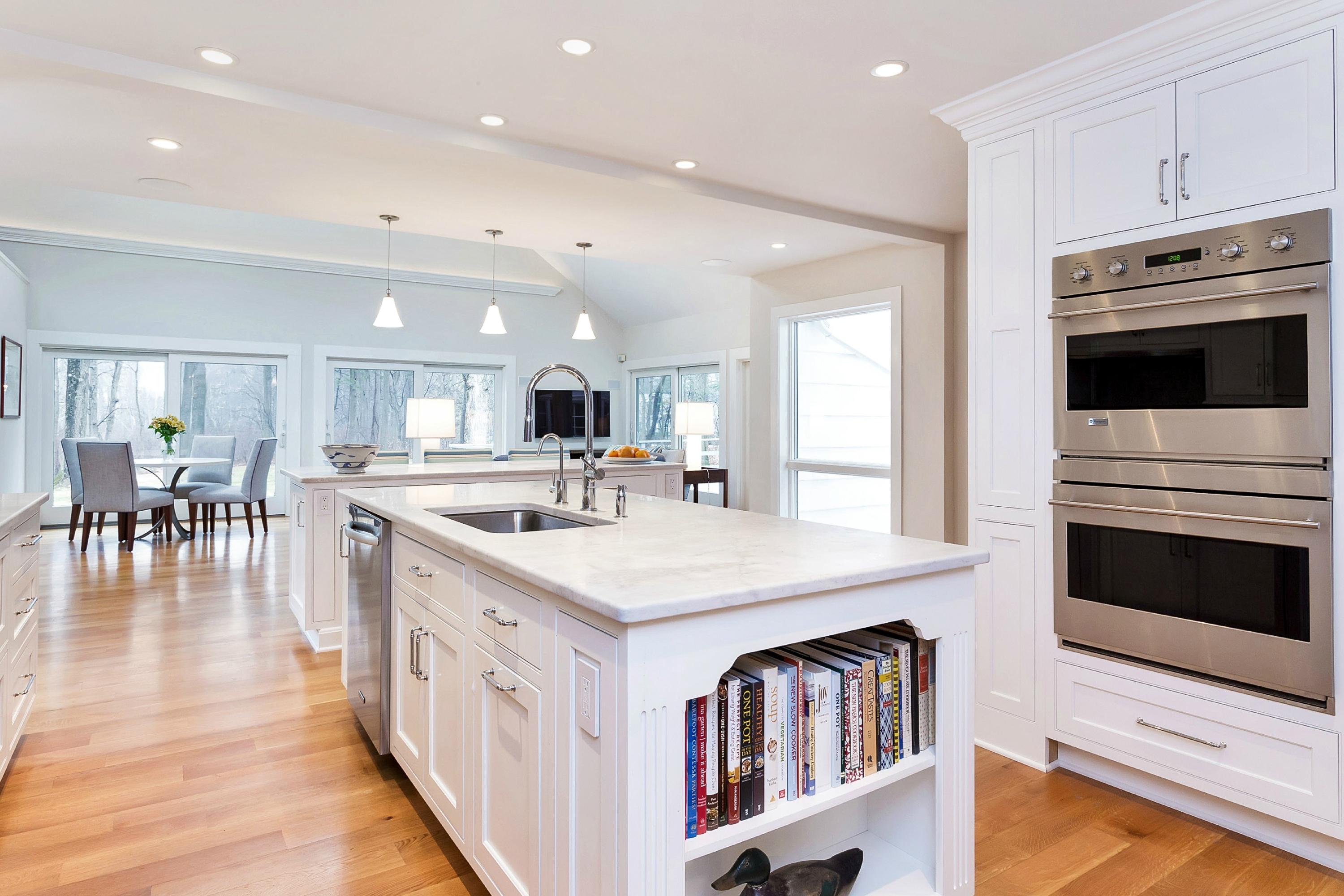 5 Meadow Road Darien, CT 06820 - Photo 5 of 25 a kitchen with cabinets and wooden floor