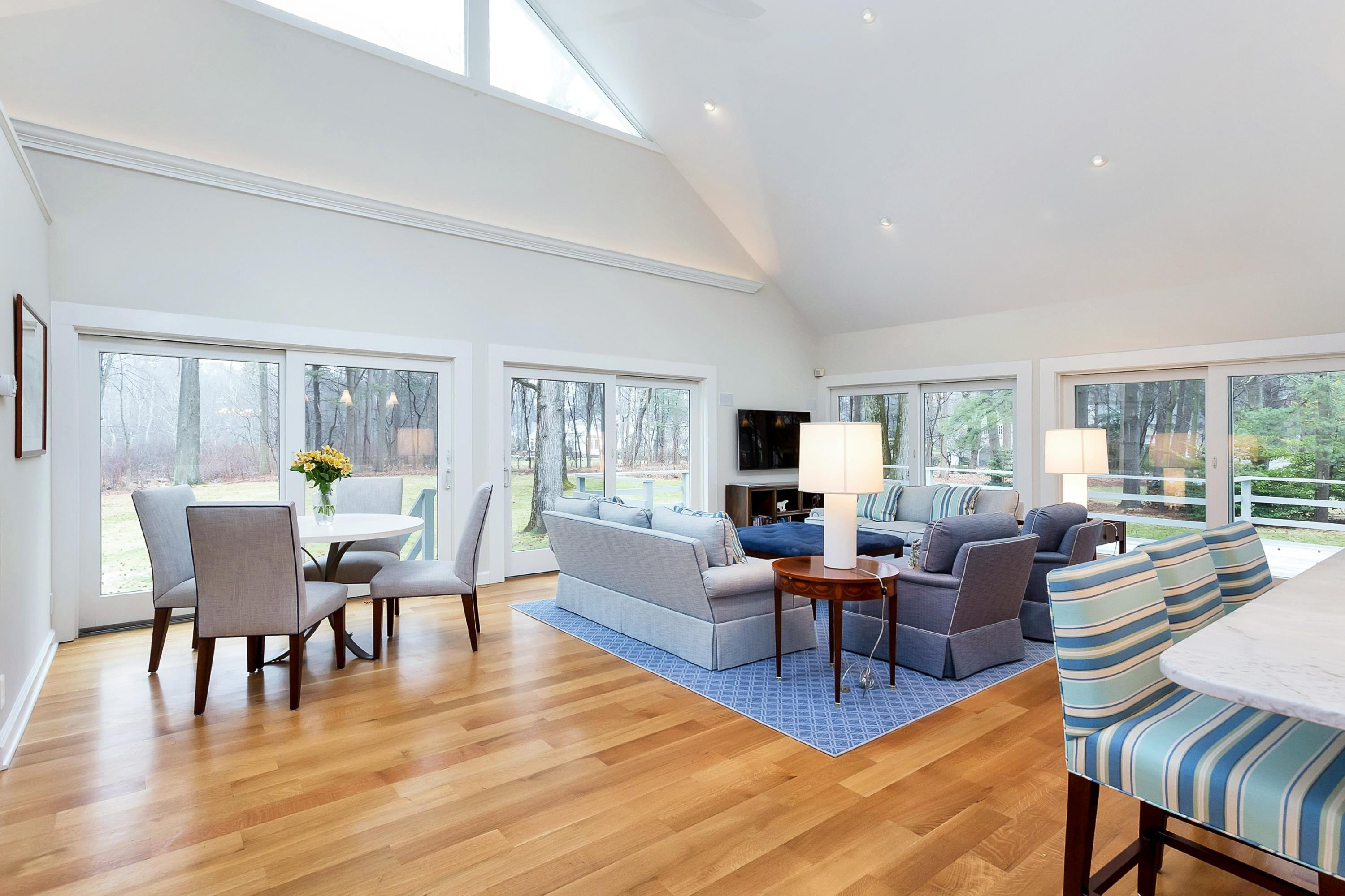 5 Meadow Road Darien, CT 06820 - Photo 8 of 25 a living room with furniture a table and a large window
